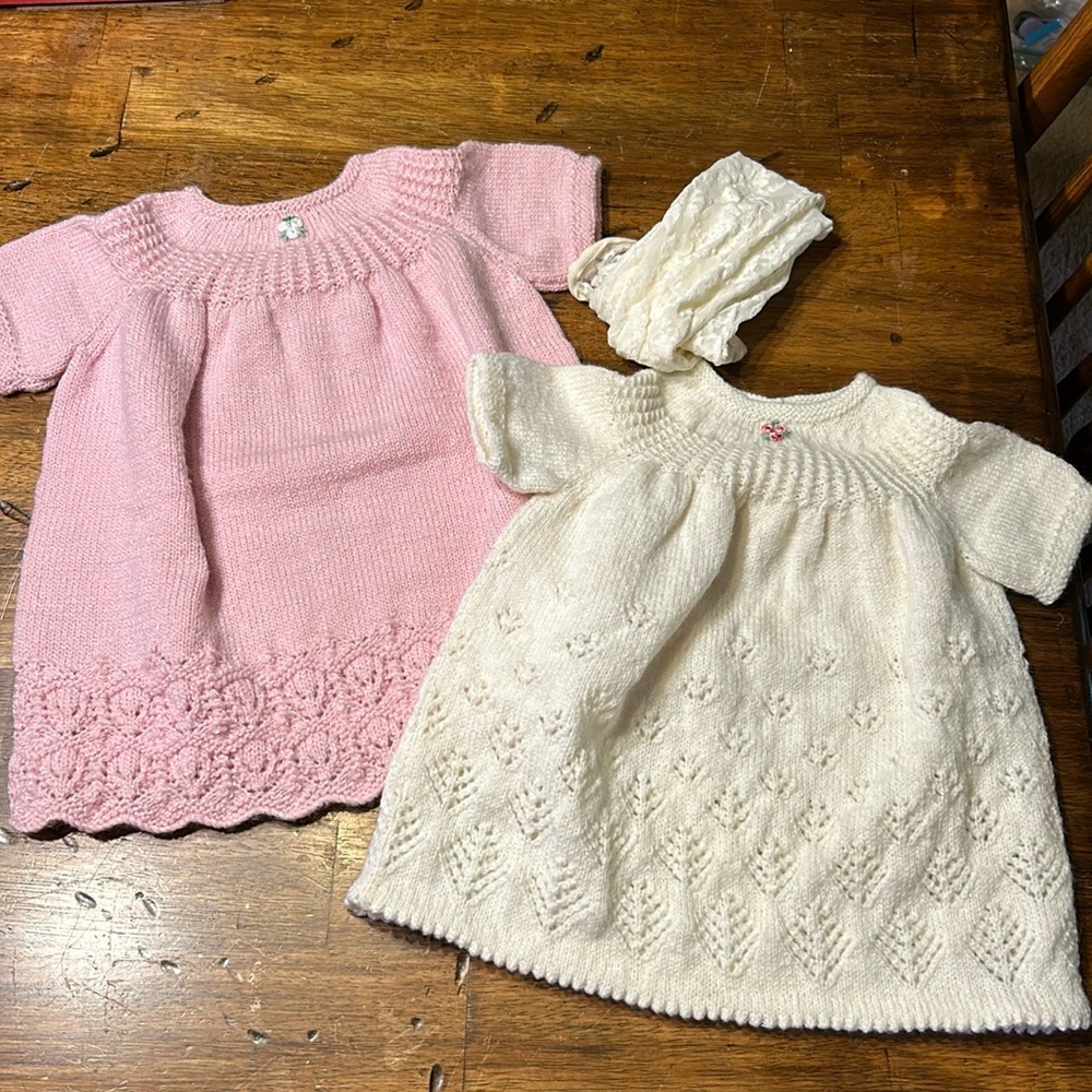 Handmade knitted baby dresses